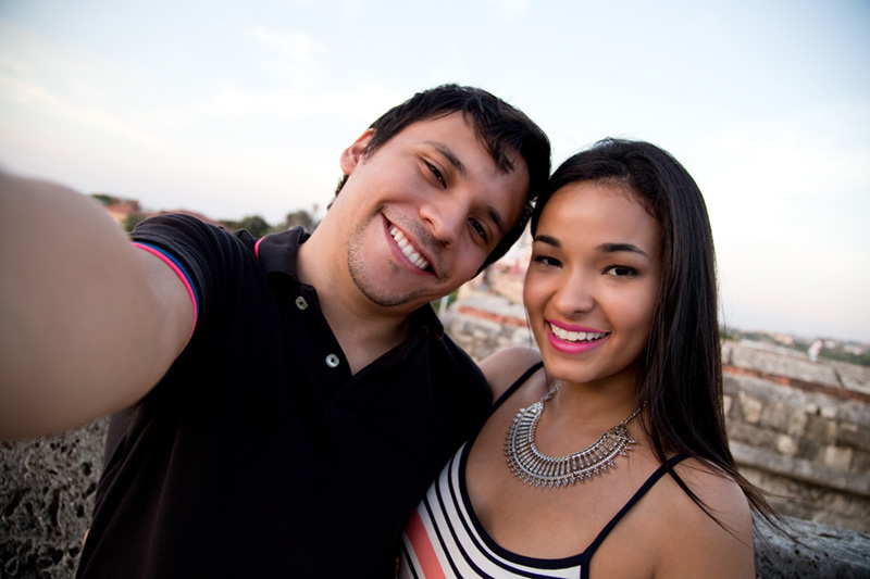 young couple smiling at the camera